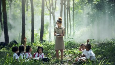 Children Learning Outdoors in the forest